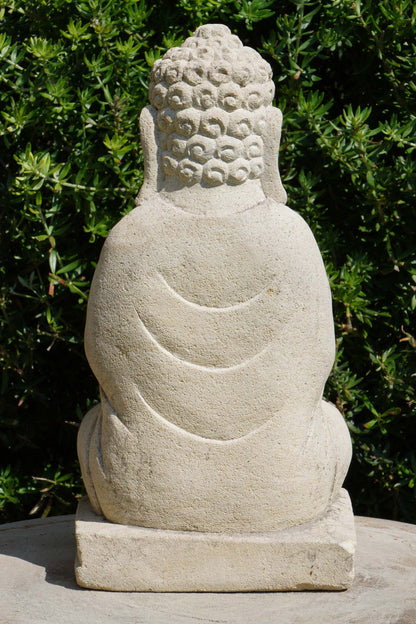 Statua Buddha in Pietra con fiore di loto H 24 cm Rif. C007