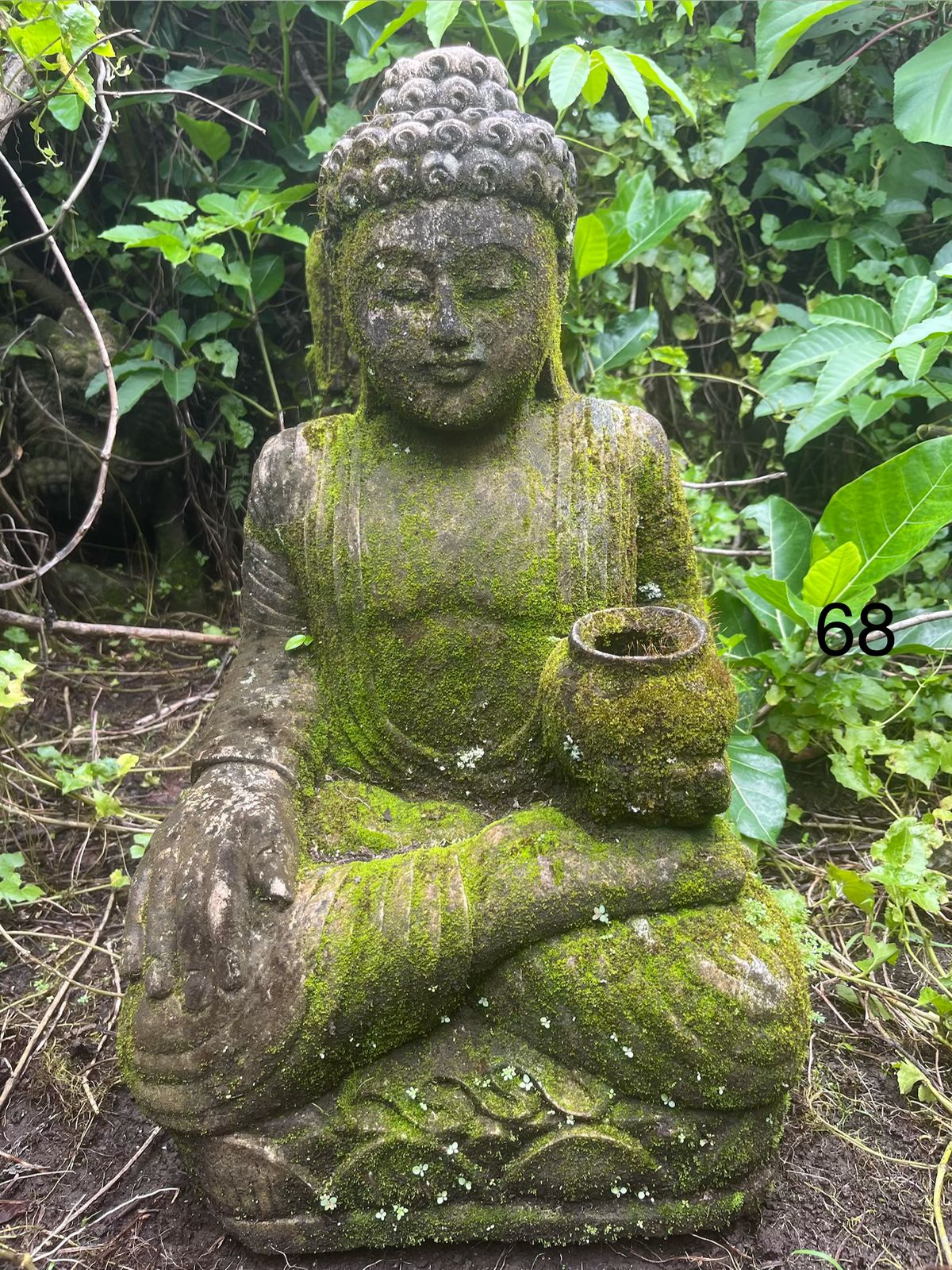 scultura buddha in pietra
